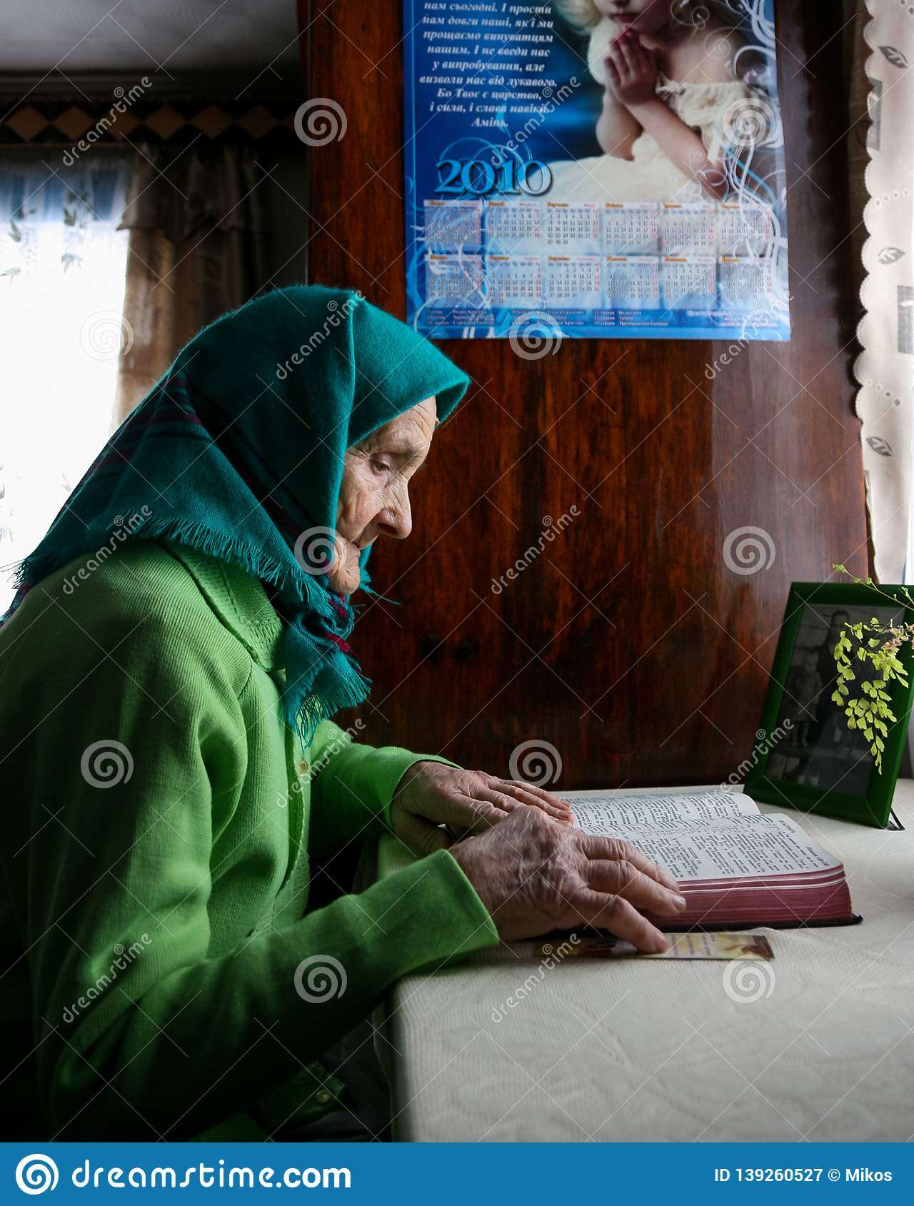 Older Women Reads The Bible Editorial Photography