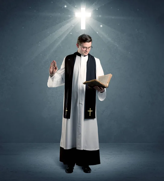 Priest with cross and holy bible  Stock Photo © photographee.eu #42132691